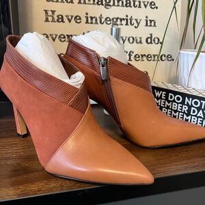 New never worn leather and suede tri-color ankle bootie.